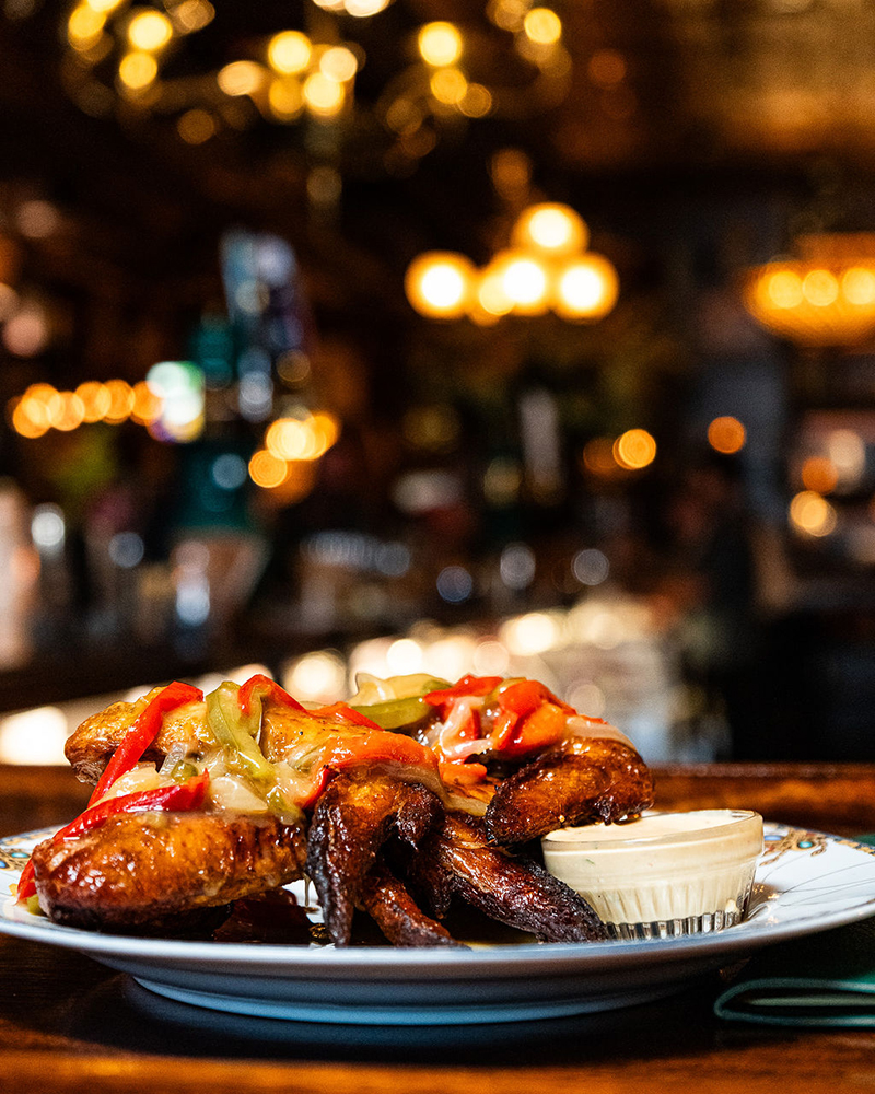 Plate of wings with dipping sauce